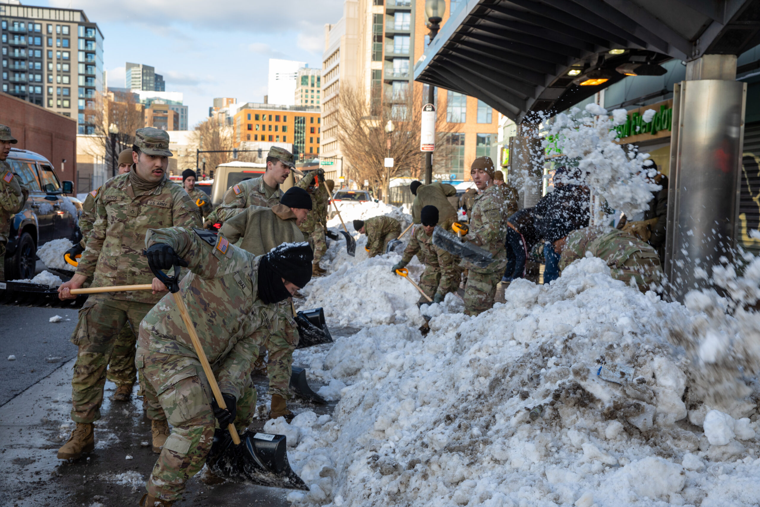 Mass Guardsmen Dig Out Boston Bus Stops